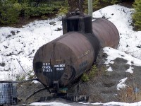 I came across this repurposed Procor Limited tank car while driving from 150 Mile House to Likely B.C. I did a search on the Canadian Freight Cars site and this is the only tank listed there with an 8398 Imp. Gal. capacity. If this is the one, it would have been #'d 18444, built late 50's or very early 60's. This location is 26 Km north of 150 Mile House at a road maintenance yard known as Pit #1888 - Skulow Lake.  