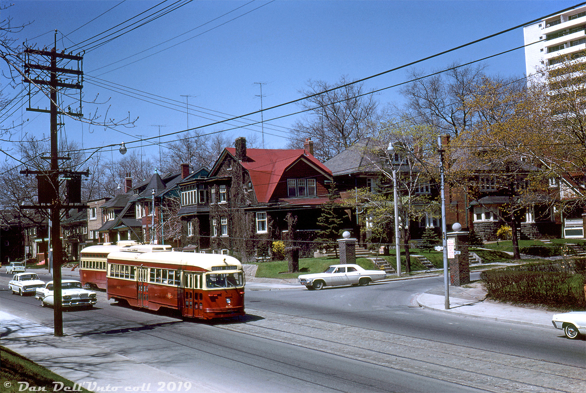 TTC PCC 4601 (an A10-class car originally built in 1940 for Cincinnati) heads eastbound through the High Park area on Bloor Street at Oakmount Road, passing a PCC heading the opposite direction while heading downgrade on the final stretch of the truncated Bloor route to Keele Subway Station. The new Bloor-Danforth subway line had been open for just a few months, and streetcars on Bloor had been cut back to two short segments at the west and east ends of the line known as the "Bloor Shuttle" and "Danforth Shuttle". New subway extensions opened at both ends of the line two years later in May 1968, rendered both remaining streetcar portions along Bloor redundant.

Present-day, the whole block of houses on this corner of Bloor and north into Oakmount and Pacific were bought up by developers and demolished 2011-2012 for high-rise condominiums. 4601 was likely one of the many older cars retired after the 1968 BD subway extensions rendered many of the older and secondhand PCC cars surplus (it wasn't one of the cars sold to Egypt however, so was likely scrapped or sold for scrap by the TTC).

John F. Bromley photo, Dan Dell'Unto collection slide.