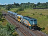 Whisking passengers between Toronto and Ottawa is VIA Rail Canada <i>Corridor</i> train 40.  VIA P42DC 902 (class EPA-42a) is pulling an LRC Business Class Car and three stainless steel coaches.  (Newtonville, Ontario - August 25, 2019)