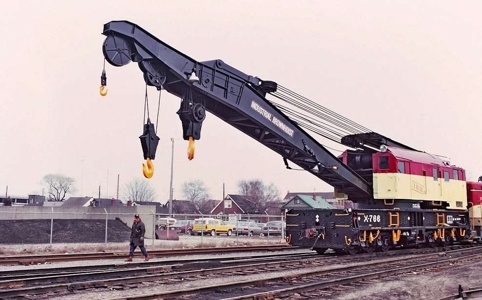 Another photo from Ray Hoadley in my collection of TH&B X-766 at or near Adams Yard, the industrial east end of Hamilton. The 250 ton Industrial Brown Hoist was used to clean up a derailment in the area. The TH&B crews sure gave this machine some TLC and a great paint scheme.
