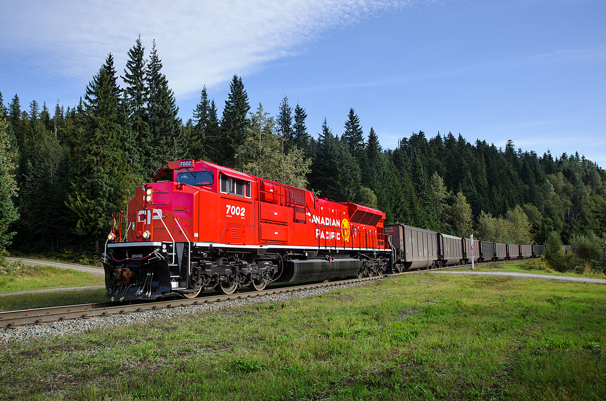 For the first time, one of CP's brand new SD70ACUs was put in the lead position on a coal train. As luck would have it (for me anyway!) it happened to be on a train destined for Prince Rupert, handed off from CP to CN at Kamloops. Here we see CP SD70ACU 7002 leading train C741 east at Mile 103 of CN's Albreda Sub between Lempriere and Clemina West. The train will eventually turn west at Harvey, east (north) of Valemount, BC for the remainder of the run to Prince Rupert.
