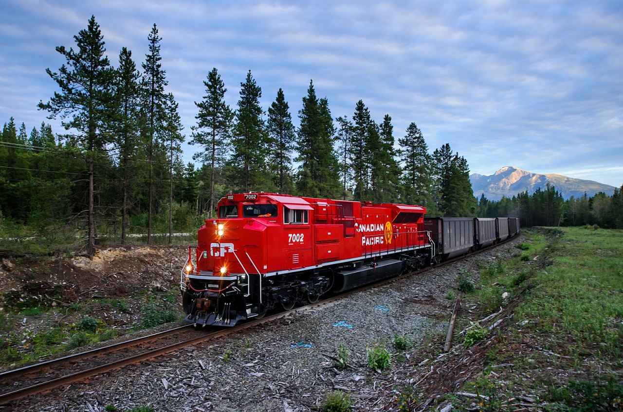 With Canoe Mountain in the background, loaded CN coal train C741 (CP 885-006 from Line Creek-Kamloops) catches the last light of the day rocketing towards an eventual destination of Prince Rupert.