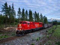 With Canoe Mountain in the background, loaded CN coal train C741 (CP 885-006 from Line Creek-Kamloops) catches the last light of the day rocketing towards an eventual destination of Prince Rupert.