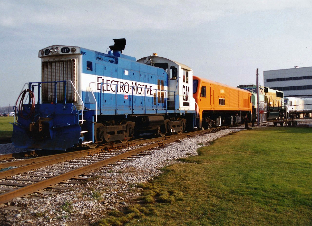 Back in the mid-1990's when we would railfan London, the first place we always drove by was the busy GMDD plant, as you never knew what would be sitting out front of the facility. Two days before Christmas in 1994 we were given an early gift, as we caught GMDD SW1001 117 switching several new locomotives in various stages of production outside the usually locked gates of the plant at Oxford Street.