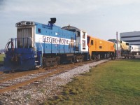 Back in the mid-1990's when we would railfan London, the first place we always drove by was the busy GMDD plant, as you never knew what would be sitting out front of the facility. Two days before Christmas in 1994 we were given an early gift, as we caught GMDD SW1001 117 switching several new locomotives in various stages of production outside the usually locked gates of the plant at Oxford Street.