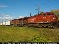 CP 8117 and 9737 slowly shove the setoff from train #140 into Windsor yard on a sunny October 9th afternoon.