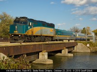 VIA "Green Weenie" 6407 heads up train #73 as it passes through Belle River, Ontario on October 23, 2019.