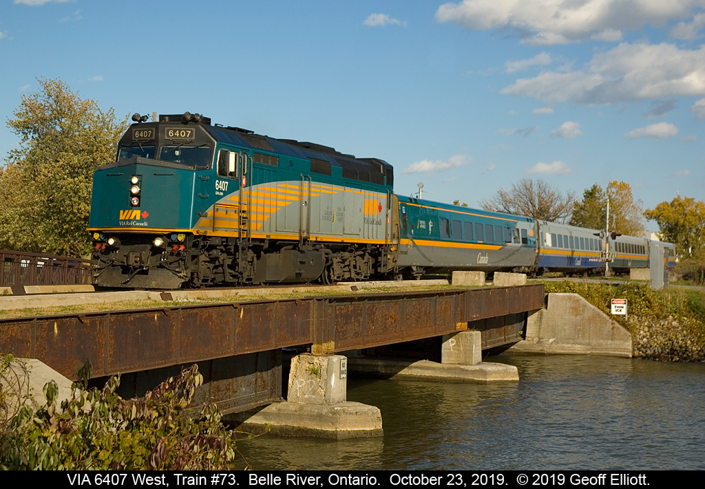 VIA "Green Weenie" 6407 heads up train #73 as it passes through Belle River, Ontario on October 23, 2019.