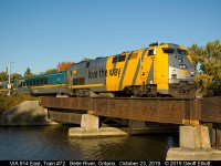 VIA "Love the Way" P42DC #914 heads up train #72 in the early morning as it rolls eastbound over the Belle River bridge in Belle River, Ontario on October 23, 2019.