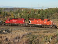 I don't see many SD40-2 engines on CP anymore so when I heard one was working in Sudbury I decided to make a special trip.  U57 started their shift around 0630 and I followed them throughout the early hours of the day as they worked in Sudbury Yard before heading up the Nickel Sub towards Vale.  With the morning sun fully risen I shot them departing Vale at Clarabelle after they had picked up a string of 46 ore cars.  From here we parted ways - 6018 and 5035 led U57 towards Levack and I headed over to the Coniston diamond.