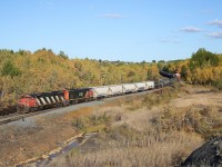 A couple of cowl units (2402 & 2444) have reached the end of the Sudbury Spur and are have just passed over the switch that connects to CP's Nickel Spur.  The train will continue to pull ahead so that they clear the switch and the power will then uncouple from the train.  All the cars from 598 will either be left here for Vale or interchanged with CP.  