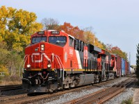 A late running M38531 21 passes through Brantford with CN 3882, CN 3238, and 160 cars