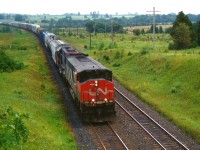 CN HR616 2117 is seen leading a westbound train through the sweeping curve at Newtonville, Ontario on July 15, 1994. CN 2117 would be retired three years later in 1997 and the all the remaining active HR616’s were retired during 1998. 