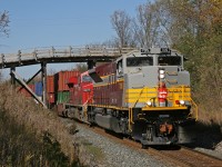 CP 100-24 eases under the wooden bridge just north of Tottenham, with CP 7015 sporting the classic Maroon & Grey Canadian Pacific livery.