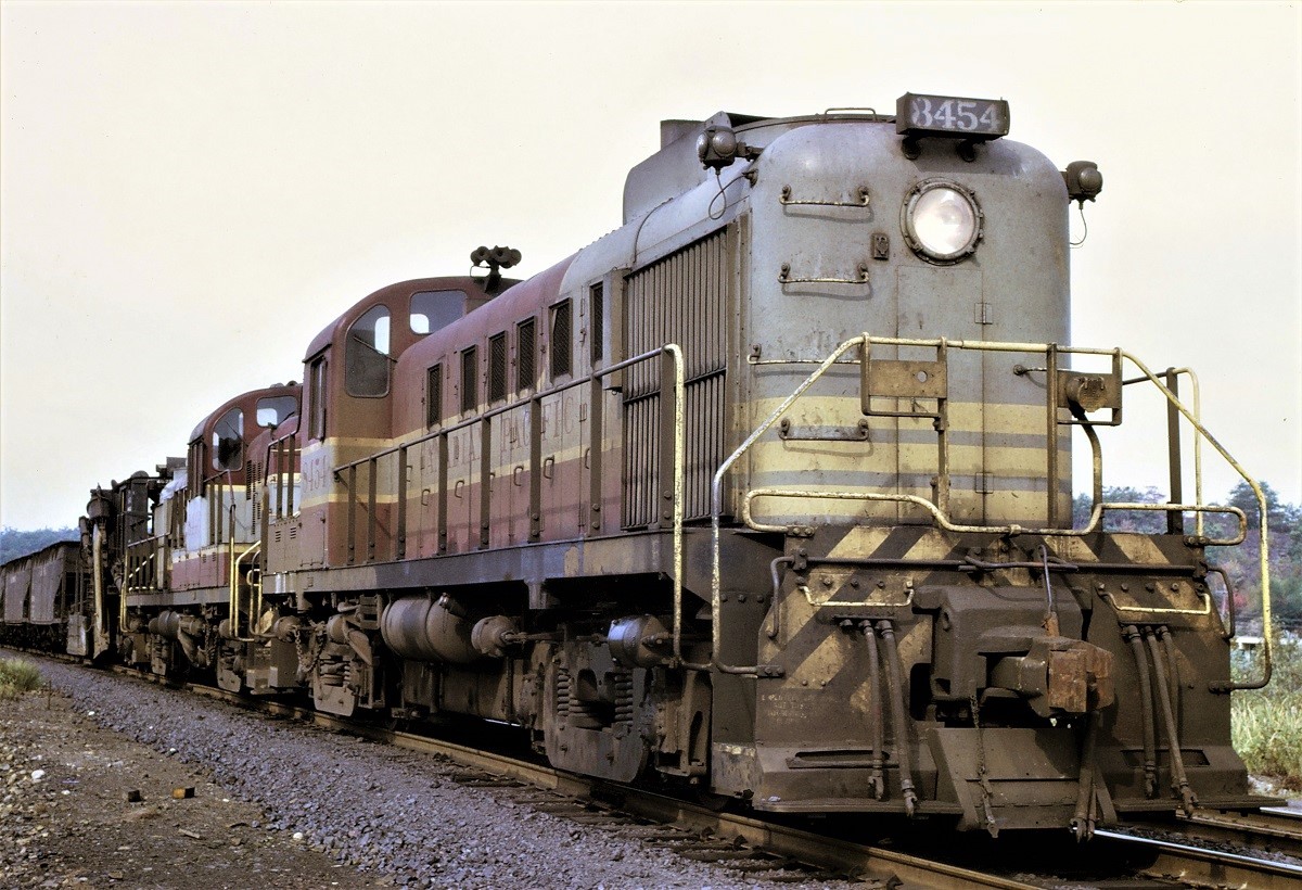 CP RS-3 8454 and another RS-3 lead a work train at Stinson, Ontario as they unload slag.  Map location is approximate.