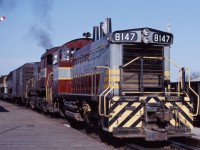 SW1200RS 8147 and RS23 8026 lead an interesting Extra West through Guelph Junction in the spring of 1964.