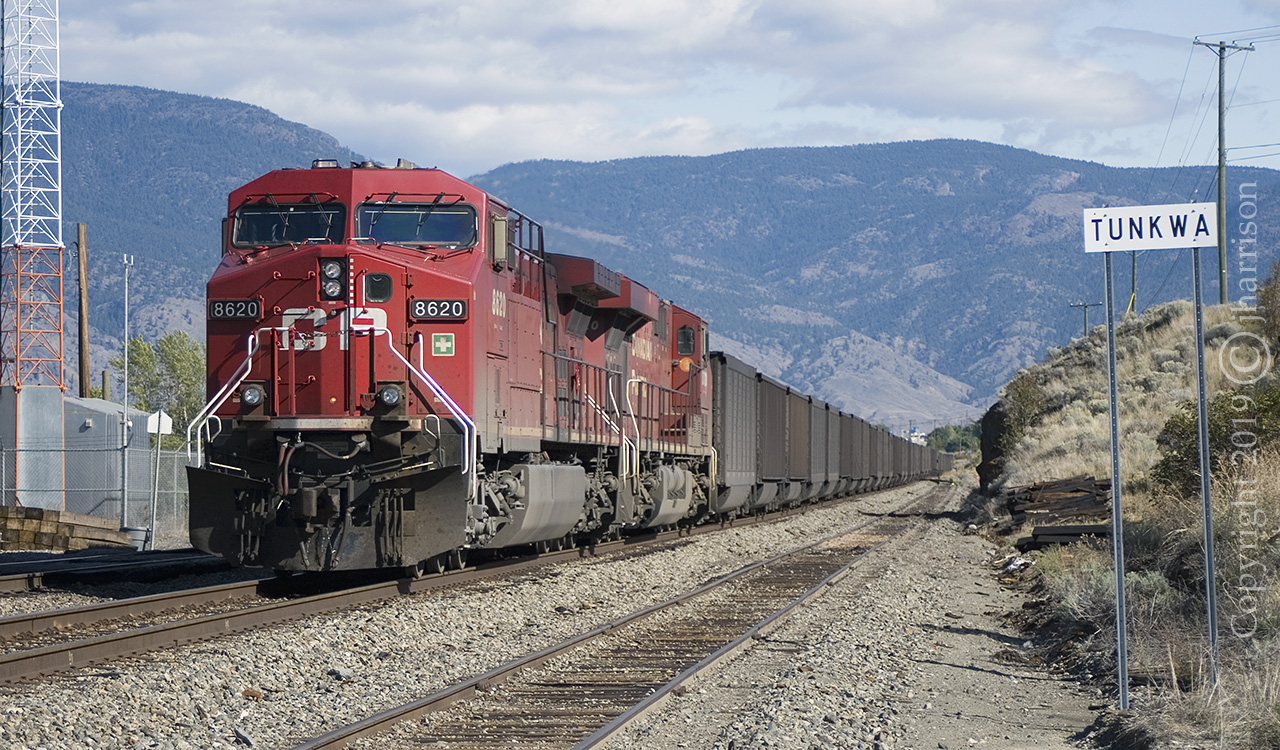 CP 8620 with the 8720 trailing is hauling a loaded coal train westward at SNS Tunkwa, and through the town of Savona, on CP's Thompson Sub. The train will veer left as is leaves town, and head down the south bank of the Thompson River, where it exits Kamloops Lake. The DPU's assigned to this train were CP 8865 and 8870.