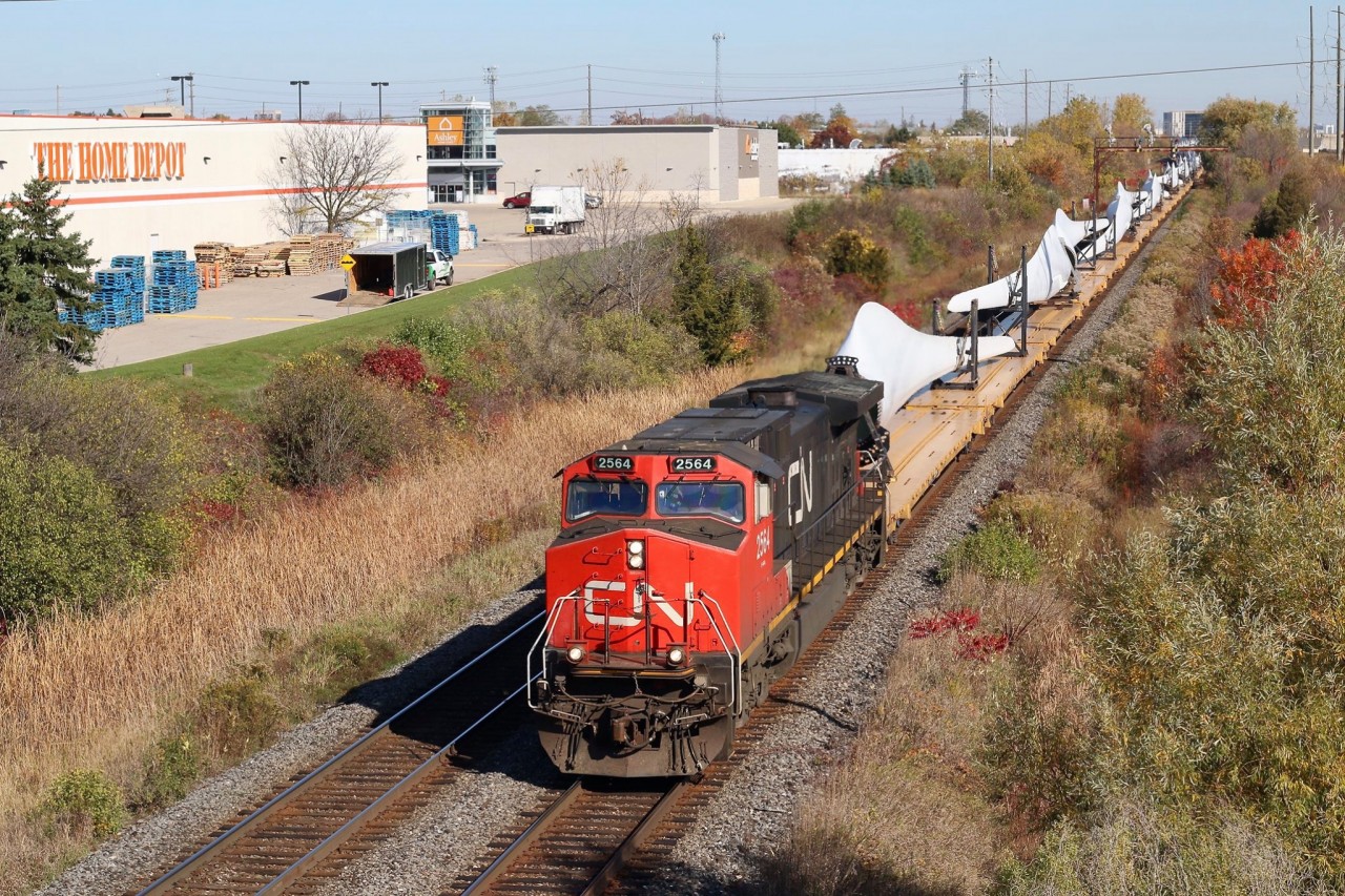 Personally these wind turbine blade trains are some of the most interesting unit trains out there. I’ve been lucky enough over the years to catch both blades and bases on both CN and CP. Here we see a westbound CN bade train running off the last mile of the Halton sub. as it is about to duck under Guelph Line in Burlington. The train is beginning to slow in preparation for a meet with CN 148 making a lift at Aldershot.