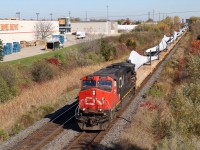 Personally these wind turbine blade trains are some of the most interesting unit trains out there. I’ve been lucky enough over the years to catch both blades and bases on both CN and CP. Here we see a westbound CN bade train running off the last mile of the Halton sub. as it is about to duck under Guelph Line in Burlington. The train is beginning to slow in preparation for a meet with CN 148 making a lift at Aldershot. 