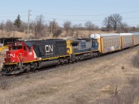 CN 393 approaches Garden Ave with a solid train of autoracks.  Providing the power on this day was CN 5400 and GECX 7362.