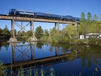 The second run of the day of the Orford Express is crossing the Eastman trestle, on its way to Bromont.
