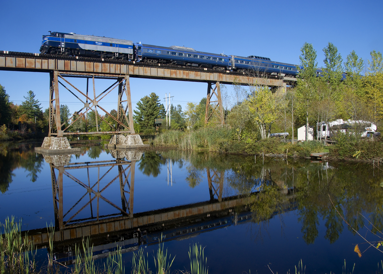 The second run of the day of the Orford Express is crossing the Eastman trestle, on its way to Bromont.