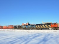 CN 5516, IC 2457 and NS 2522 provide power on a CN 120 with a very interesting lashup. Since this photo was taken CN 5516 was retired and NS 2522 was converted to SD70ACC NS 1818. As well, CN 120 is now run with a DPU 99% of the time, so the chance of a cowl leading is negligible.