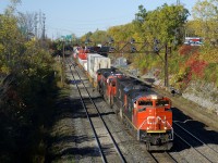 CN 120 has CN 8022, CN 5706, CN 2996 & CN 4802 up front (and CN 8928 mid-train) as it exits Taschereau Yard with intermodal traffic bound for the Maritimes.