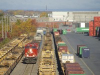 CP 253 is passing through Lachine IMS Yard, where it will set off cars before continuing to St-Luc Yard. Leading is nearly brand new rebuild CP 8069.