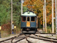 London & Port Stanley car number 8 departs the Halton County Radial Railway museum at 3:30 p.m. for a short run down to the east end of the line.  The car is too large to negotiate the loop tracks at each end of the line, so the ride isn't quite as fun as on one of the street cars.  What it lacks in ride it makes up in appearance; the car was built in 1915 by the Jewett Car Company of Newark, Ohio and has been beautifully restored.