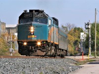 Running slightly behind schedule, VIA Rail train 85 is departing Kitchener with 6417 west. 