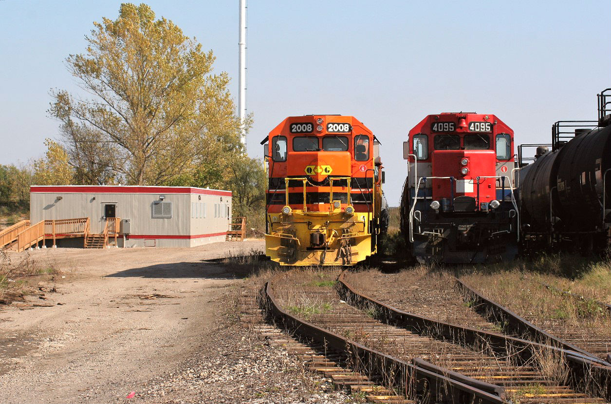 During the last month of Goderich-Exeter Railway operations on the Guelph Supervision, the railway kept their units mostly tied-down at the Kitchener yard, rather than across from the Kitchener VIA Rail station. Here two sets of GEXR motive power are seen on a Sunday afternoon beside the newly constructed future CN Guelph Subdivision Operations Centre.