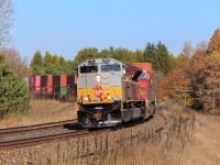Canadian Pacific train 100-24, rounds the curve at the north end of Palgrave.