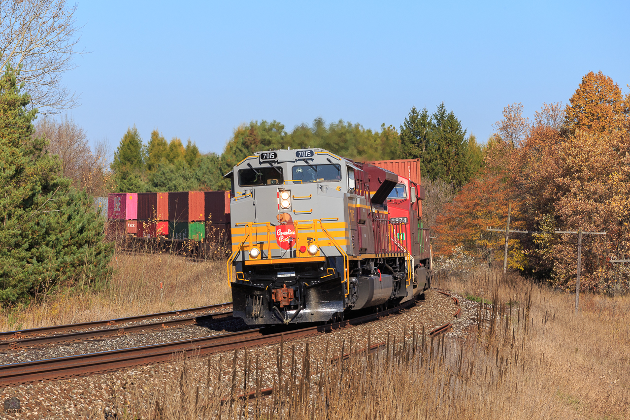 Canadian Pacific train 100-24, rounds the curve at the north end of Palgrave.