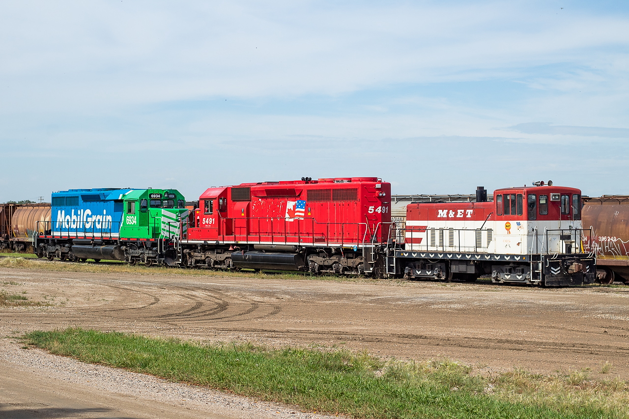 A pretty eclectic lashup rests outside the Last Mountain Railway shops in Aylesbury.