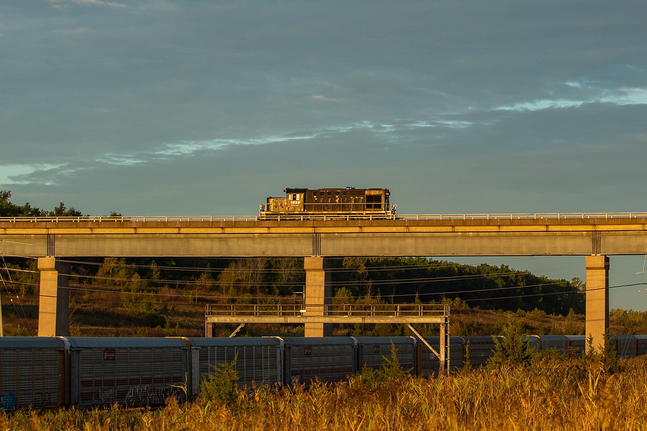 1859 heads down the Canal Spur and over the CP Hamilton Sub light power in the golden morning light, as they head to WH Yard to lift some cars and then proceed back over to Dain City where they would spend the day working the biodiesel plant.