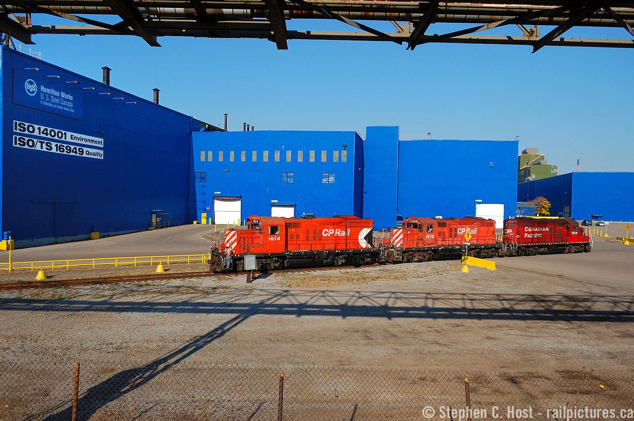 Three geeps, three paint schemes with a nice (I use this term sarcastically) sky blue US Steel Hamilton works. These were dark days for the former Stelco, but the train action was still good as the recession was just a couple months from hitting peak and output had not yet been fully slashed. The blast furnace was turned on again in August, it was shut down again in October 2010, only to be idled for 3 years then permanently shut down. I was on my way to my Brothers with my daughter and wife and this was just one of my random run-ins en-route to a family visit.. just a couple photos and I did not give chase, wish I did but these were different times for me. Young kids will do that to you, with a second on the way at this point so my goose was cooked :) Happy to have what I have!