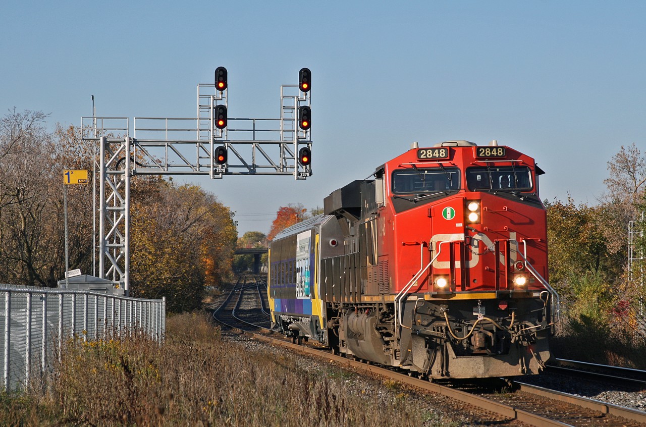 CN X 14791 27 originated at Glenn Yard in Chicago and operated with CN 2848 and SIIX 9024, a Siemens passenger car destined for Ottawa, Ontario.