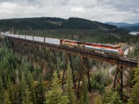 BCOL C40-8Ms 4613 and 4604 soar high above the Prairie Creek a few miles west of Hinton with Edmonton bound train M348 in tow.