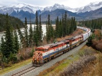BCOL C40-8Ms 4613 and 4604 lead a long and heavy Prince George-Edmonton train M348 away from Swan Landing, approaching Solomon on the Edson Sub.