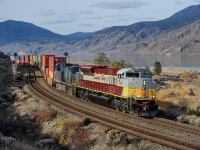 Wearing CP's new "Script" heritage scheme, CP SD70ACU 7010 leads Vancouver IMS-Toronto Yard train 100-23 past Mile 16 on the Thompson Sub knocking down the approach signal to Cherry Creek.