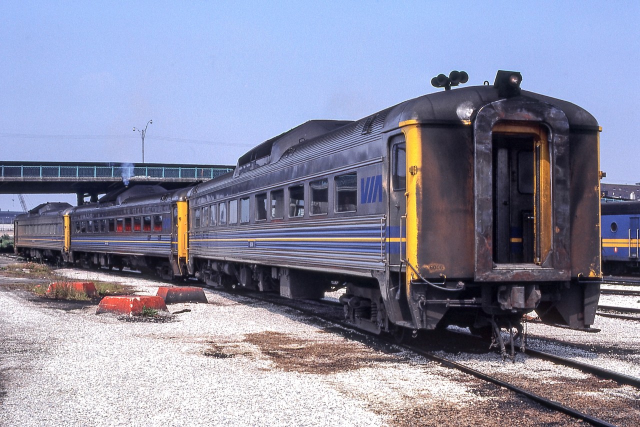 Three VIA RDC's led by VIA 6006 sit at the CN Spadina engine facility in Toronto on July 4, 1981.
