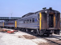 Three VIA RDC's led by VIA 6006 sit at the CN Spadina engine facility in Toronto on July 4, 1981.
