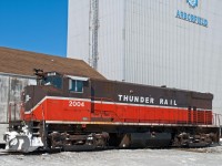 With its run to Crooked River and back now complete, Thunder Rail 2004 sits tied down next to an elevator in the Railway's home town of Arborfield. 