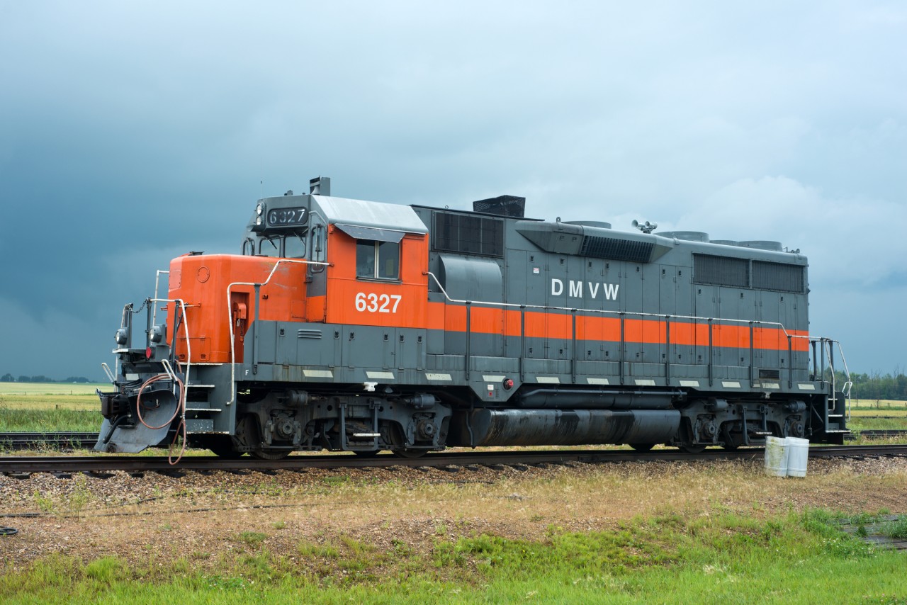 The Provident Grain elevator at Gaudin Alberta is home to this former SP GP35. The 1964 built EMD has the weekend off and is seen here between thunder storms.