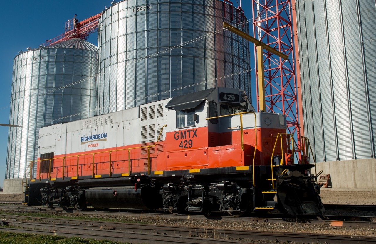 This exCNW GP15-1 is stationed at an elevator along the CN Warman Sub just north of Saskatoon. An interesting feature of this unit is the carbody air intakes, only Frisco and CNW ordered this feature.