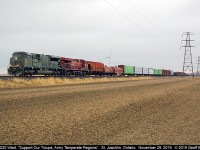 Feeling like dejavu of CP train #235 yesterday that had CP Military Unit 7021, here's today's 141 with CP 7020 at St. Joachim this morning.  Unlike 235, this 141 was haulin' ass today. Thanks to Luke Bellefleur for the Chatham O/S and to Tim Hesketh for giving me a h/u about this. 2 of the 5 units in 2 days.  Not bad!!