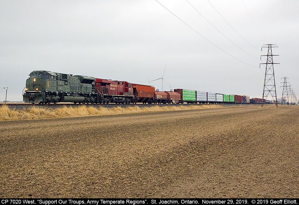 Feeling like dejavu of CP train #235 yesterday that had CP Military Unit 7021, here's today's 141 with CP 7020 at St. Joachim this morning.  Unlike 235, this 141 was haulin' ass today. Thanks to Luke Bellefleur for the Chatham O/S and to Tim Hesketh for giving me a h/u about this. 2 of the 5 units in 2 days.  Not bad!!