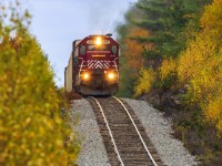 NBSR 6315, still in it's old paint scheme, leads train 907, as they will begin the descent down the dip at Cork, New Brunswick. 