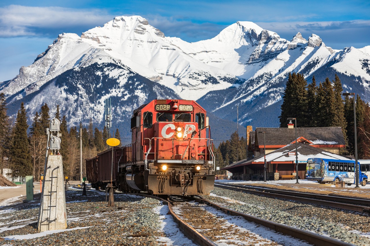 Mount Girouard looms in the background as a lone, road-worn SD40-2 works the yard at Banff, Alberta.